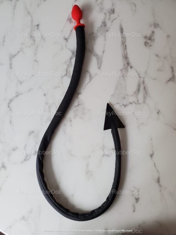 Black and red plug tail with arrow-shaped tip and smooth finish.