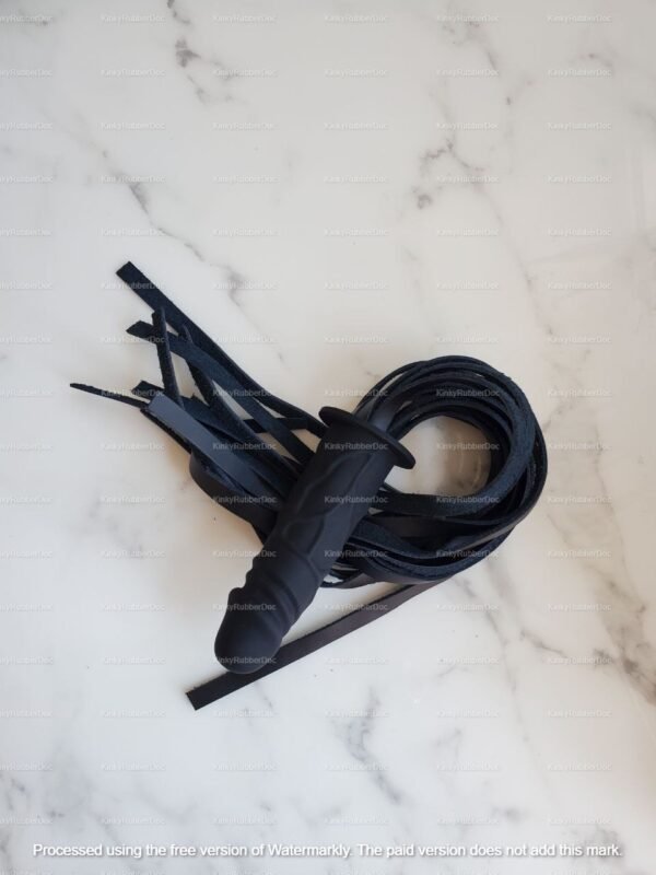 Black faux leather flogger with a textured phallic handle.