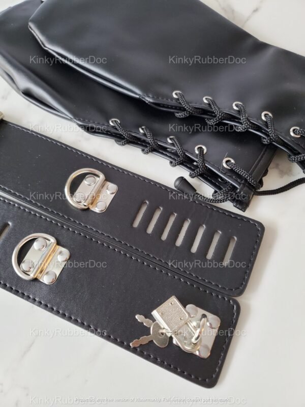 Black leather bondage mitts with lace-up details and locking cuffs.