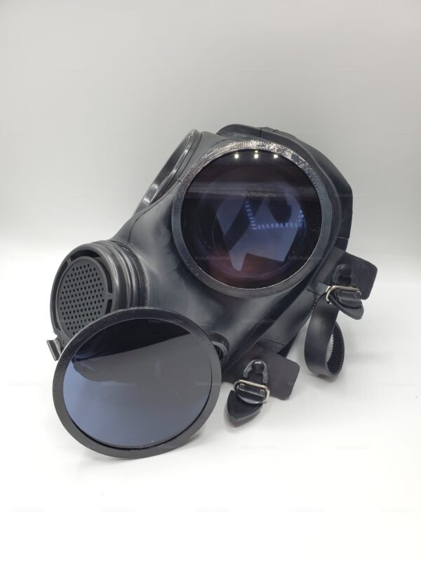 Sleek black gas mask with tinted lens covers and adjustable straps for a bold fetish look.