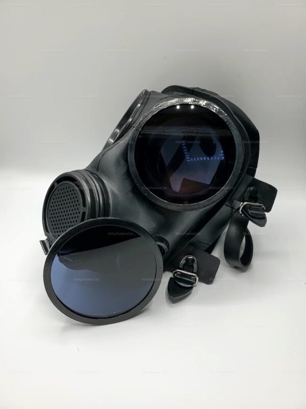 Black gas mask with reflective lenses and detachable covers, designed for cosplay and fetish roleplay.