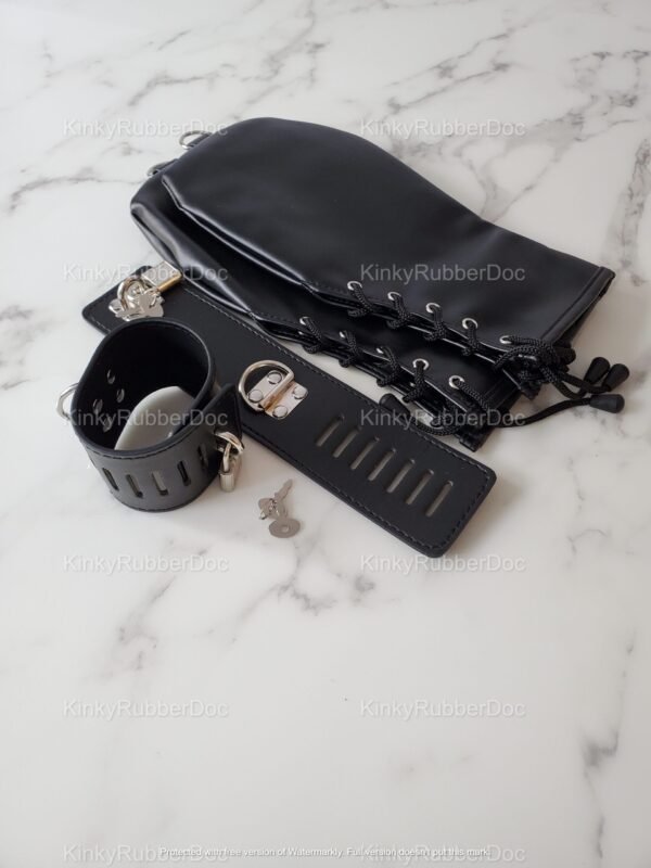 Elegant black cuffs and mitts set with lace-up details and locking mechanisms.