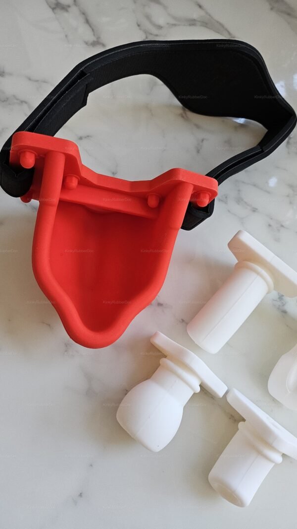 Red rubber funnel mask with adjustable strap and four interchangeable white rubber gags – watersports and piss play gear by KinkyRubberDoc