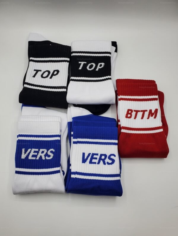 High socks in black, white, blue, and red with bold text labels for a playful touch.
