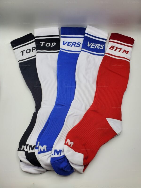 Colorful fetish socks in black, blue, and red with bold text designs.