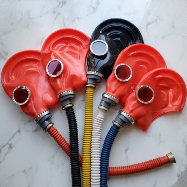 Vibrantly colored gas masks in red and black with textured hoses, perfect for cosplay or fetish fashion.
