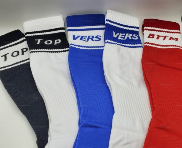 A collection of high socks in black, white, blue, and red with bold lettering.