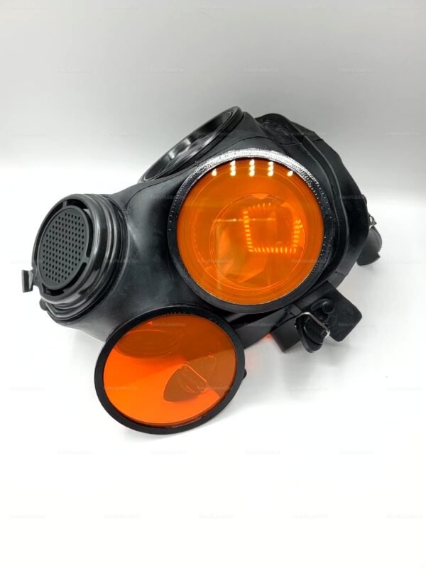 Black gas mask with vibrant orange lenses for a bold, futuristic look.