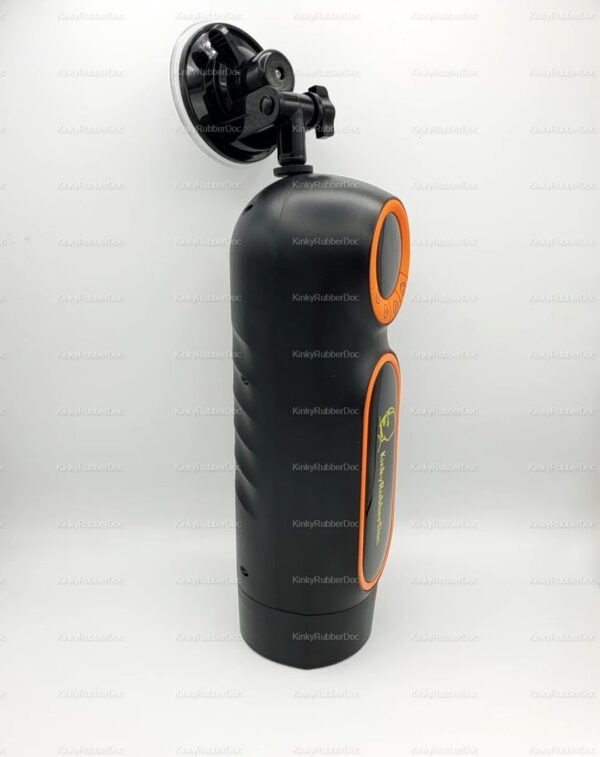 Sleek black and orange vacuum masturbator with suction mount for hands-free pleasure.