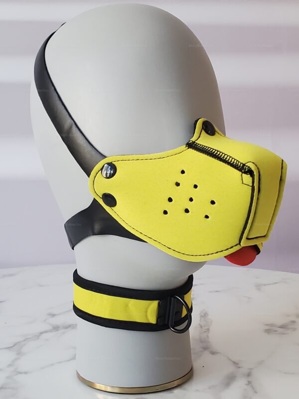 Bright yellow neoprene muzzle with adjustable black straps and perforated detailing.