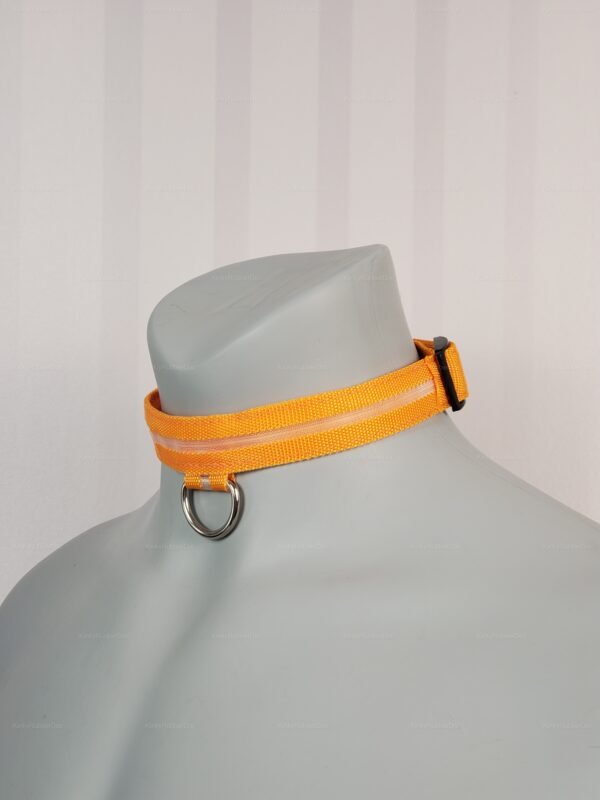 Orange nylon LED collar with metal ring for adult fashion and fetish gear.
