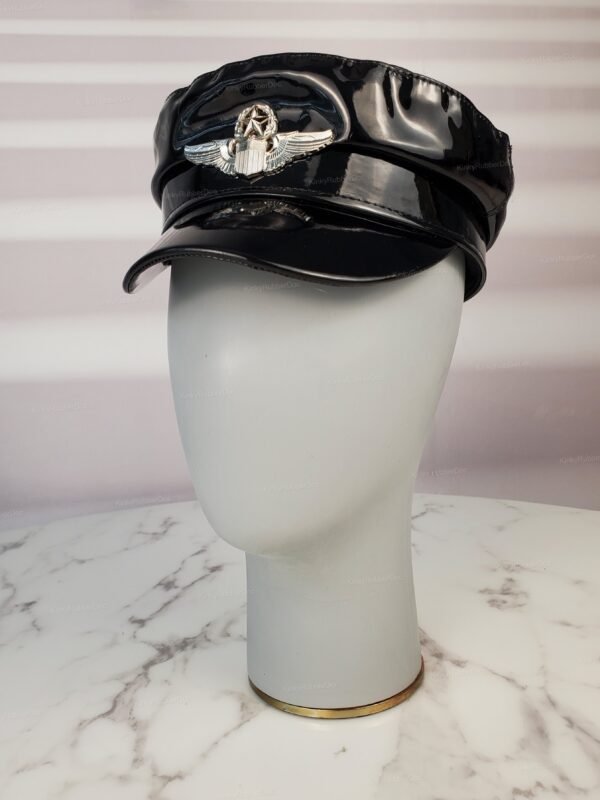 Shiny black PVC fetish cap with a silver emblem and visor.