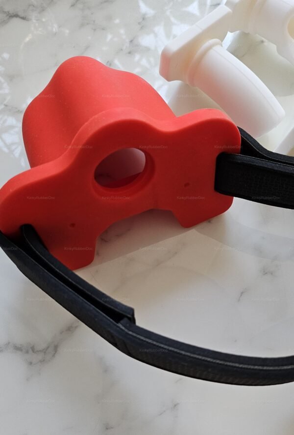Red funnel with black strap for adult kink wear.
