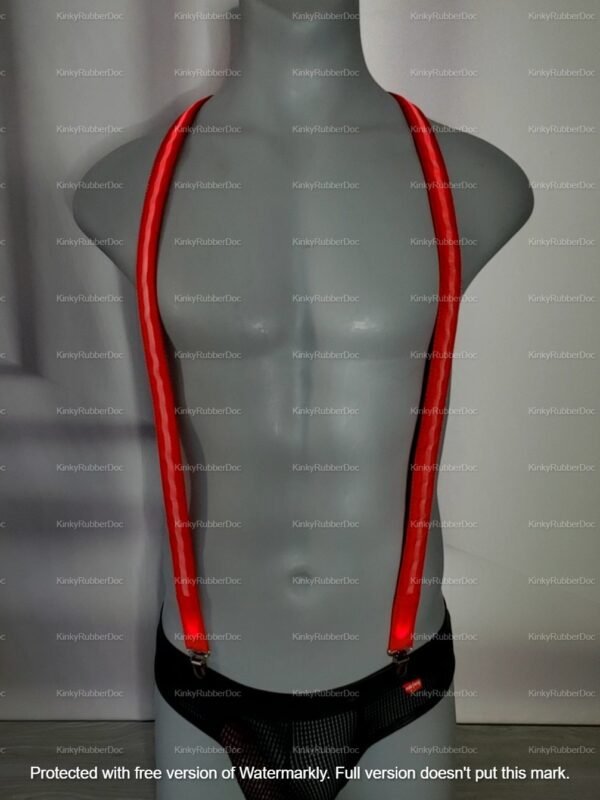 Front view of red nylon LED suspenders glowing on mannequin with black mesh gear
