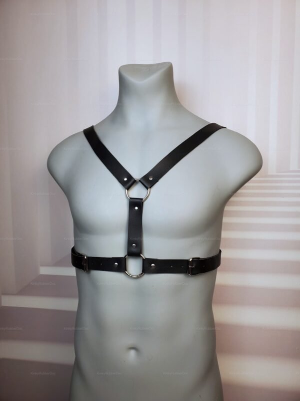 Unisex adjustable body strap harness with sleek black leather and metal rings.