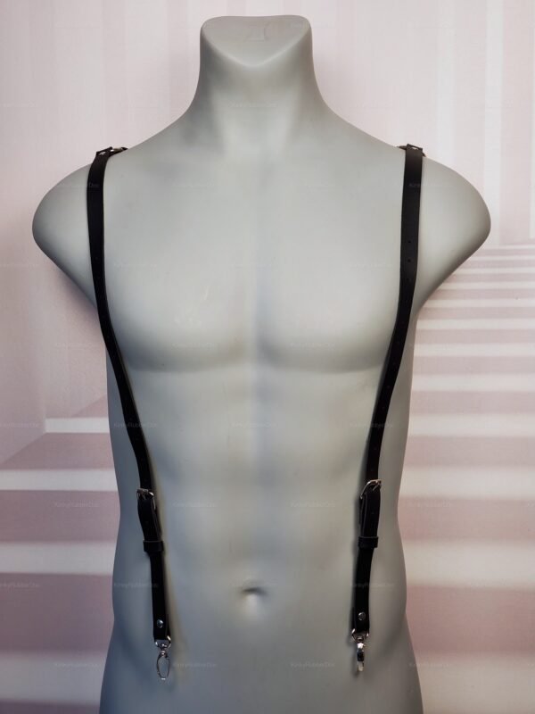 Adjustable faux leather suspender harness with sleek black straps and metal buckles.