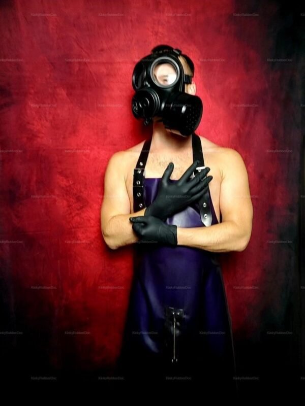 Sleek latex apron with front zipper, paired with matching gloves and a gas mask.