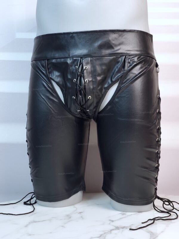 Black faux leather thigh shorts with lace-up design and side lacing details.