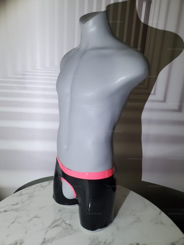Black latex open-crotch buttless chap shorts with a sleek pink waistband, offering a bold and provocative design.
