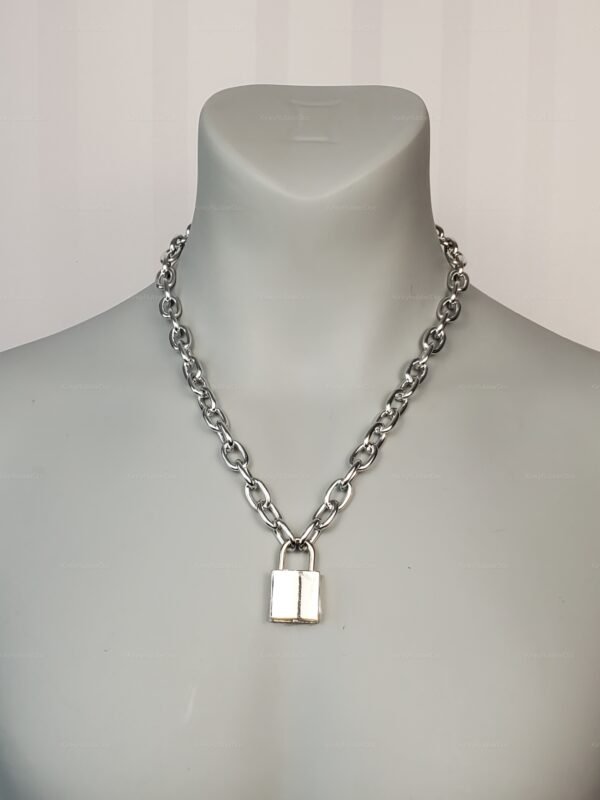 Silver chain collar with a padlock, designed for a bold and edgy statement.