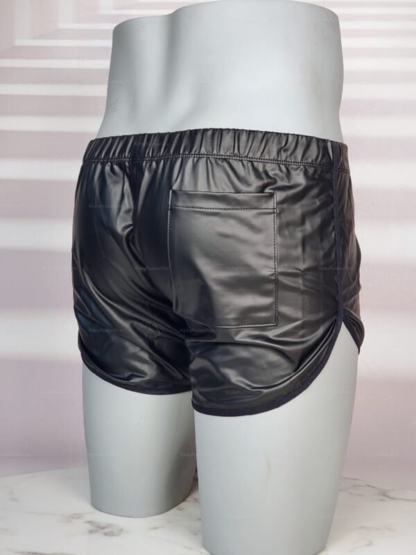 Sleek black faux leather shorts with a back pocket, featuring an elastic waistband for a comfortable fit.