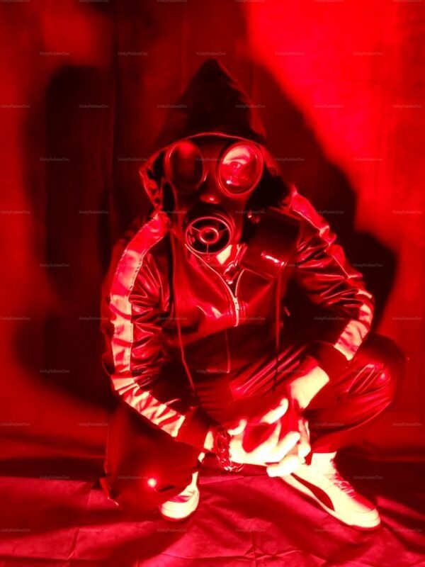 Faux leather tracksuit with sleek, shiny finish and bold stripes, paired with a distinctive gas mask for an edgy, fetish-inspired look.