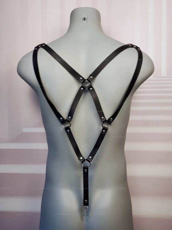 Black leather harness with metal clips designed for an edgy, stylish look.