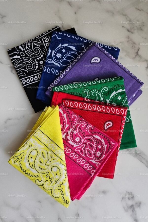 **Alt Text**: A collection of colorful bandanas in black, blue, purple, green, red, pink, and yellow, each featuring a paisley pattern.