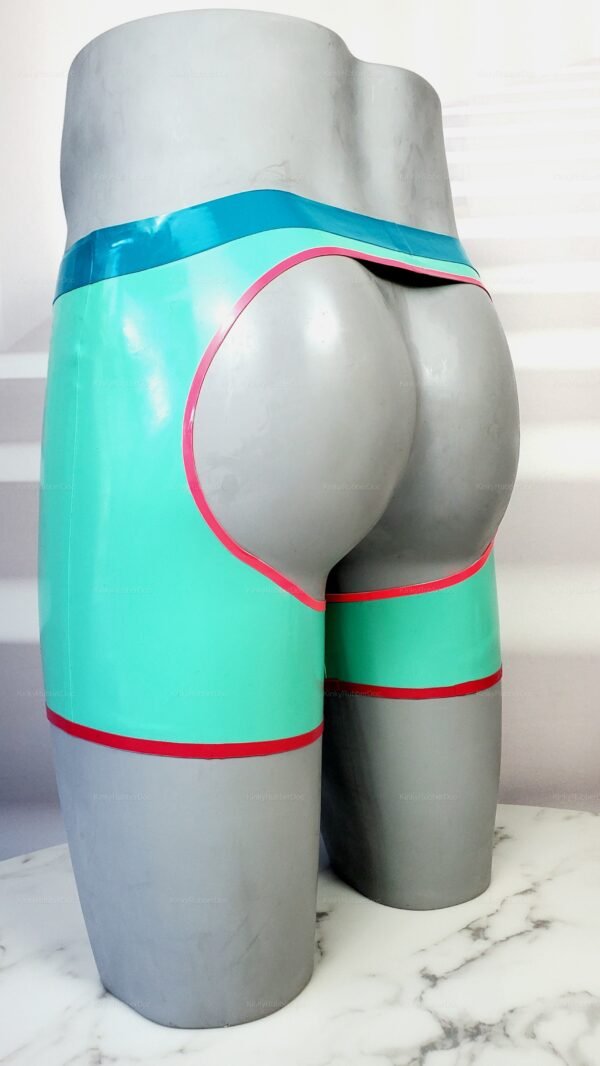 Vibrant latex shorts with open rear design, featuring teal and red accents.