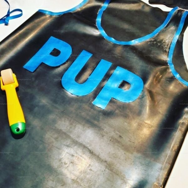Black latex shirt with blue trim and bold "PUP" lettering.