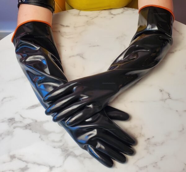 Long black latex gloves with an industrial vibe and orange trim.