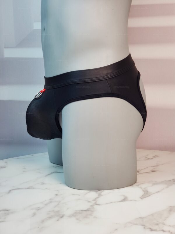 Black leather jockstrap with open back and metal ring detail.