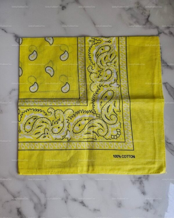 Bright yellow cotton bandana with intricate paisley patterns.