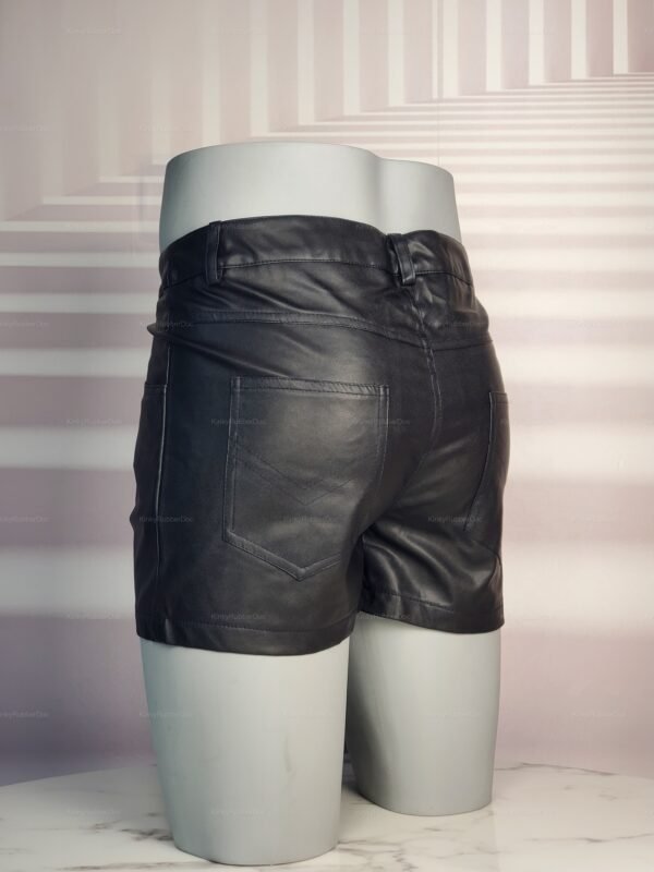 Black leather-look shorts with back pockets on display.