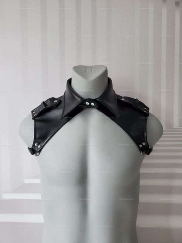 Unisex black leather harness with shoulder and collar detailing.