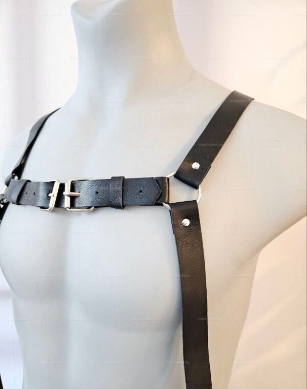 Unisex faux leather body harness featuring adjustable straps and metal buckles.