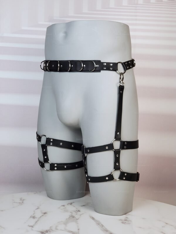 Black Waist-to-Thigh Leather Harness with metal ring accents.