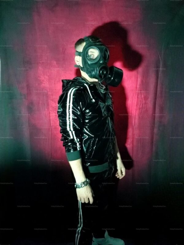 Shiny black wetlook jacket and pants set with a gas mask, against a dark red background.