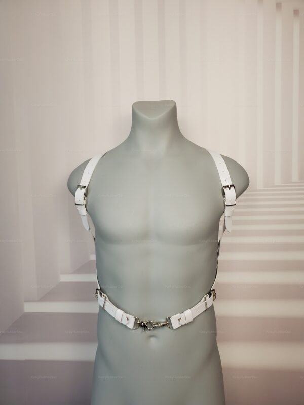 White faux leather harness with adjustable straps and metal accents.