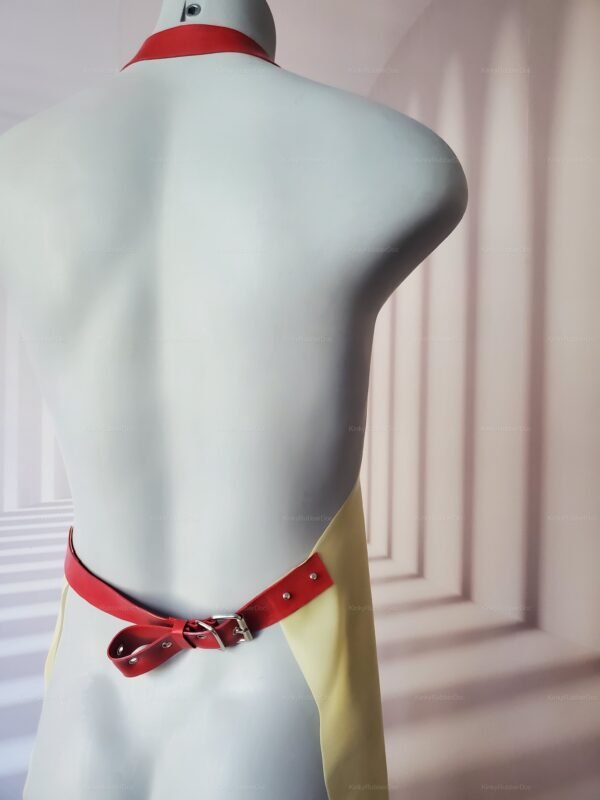 A sleek, adjustable red buckle latex apron with a striking yellow panel, designed for a bold, edgy look.
