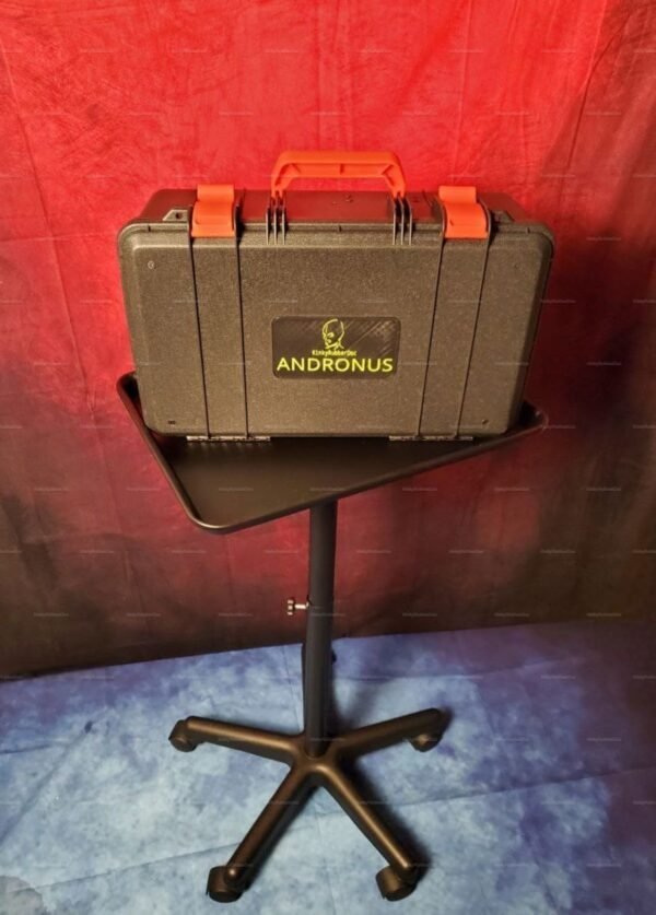 A sleek BDSM electrostim device kit with a sturdy black case, accented by vibrant red locks, designed for adventurous sensory play.