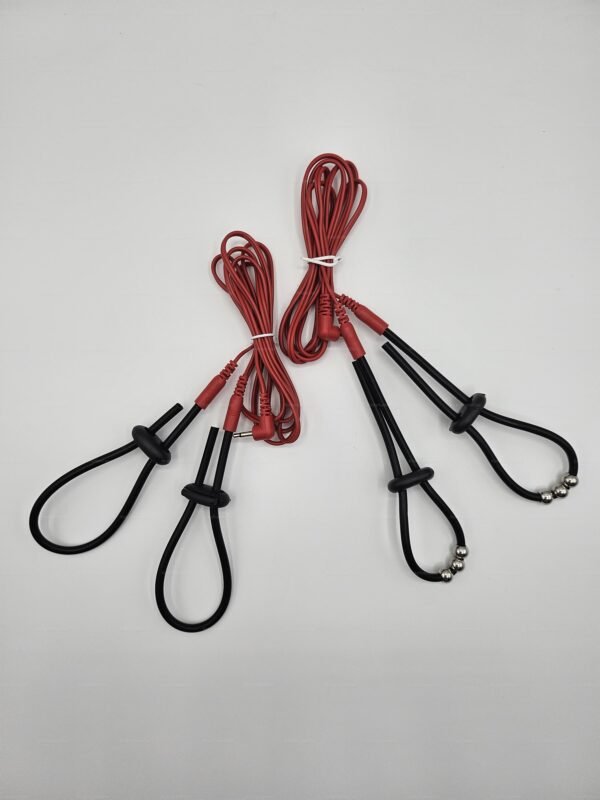 A set of BDSM penis Electro Cock Ring Straps with red cables and adjustable black loops.