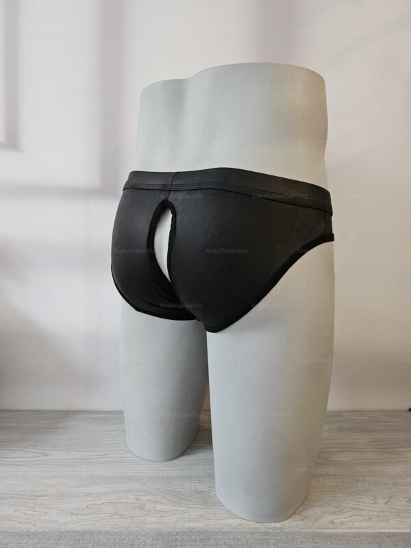 Black faux leather briefs with a unique back access design, highlighting a sleek and daring look.