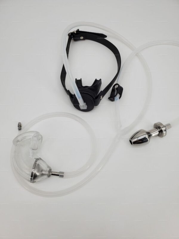 Closed-circuit fetish hose gag setup featuring black leather straps and clear tubing with metal accents.