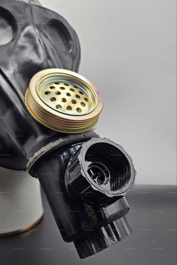 A vintage-style latex gas mask with a retro design and metallic accents, showcasing a unique blend of style and intrigue.