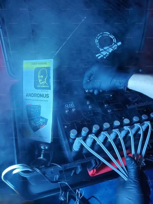 A sophisticated electro-play case featuring sleek controls, multiple connectors, and a user manual for the "Andronus" stimulation device, enveloped in an atmospheric blue glow.