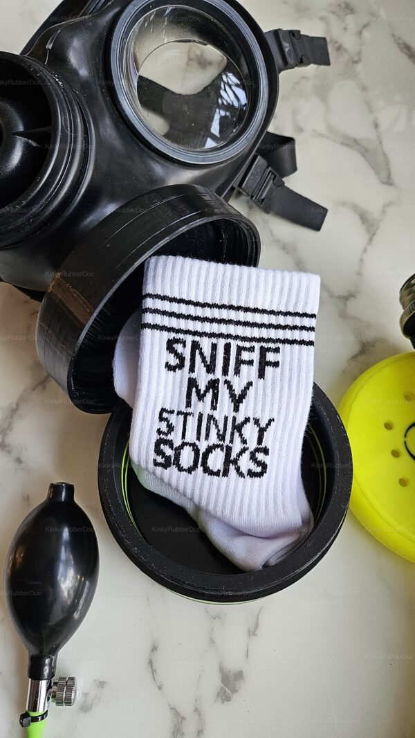 Custom sniffing canister with paw print top featuring a playful sock for a unique sensory experience.