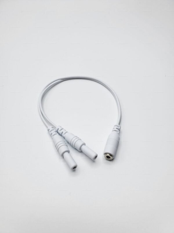 A sleek electrosex cable adapter with white connectors and flexible wiring, designed for kink enthusiasts.