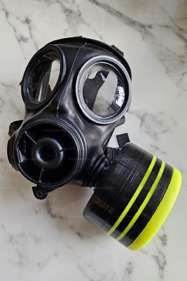 A sleek black RD40 gas mask with a striking neon yellow-striped attachment, designed as a fetish-sniffing accessory.