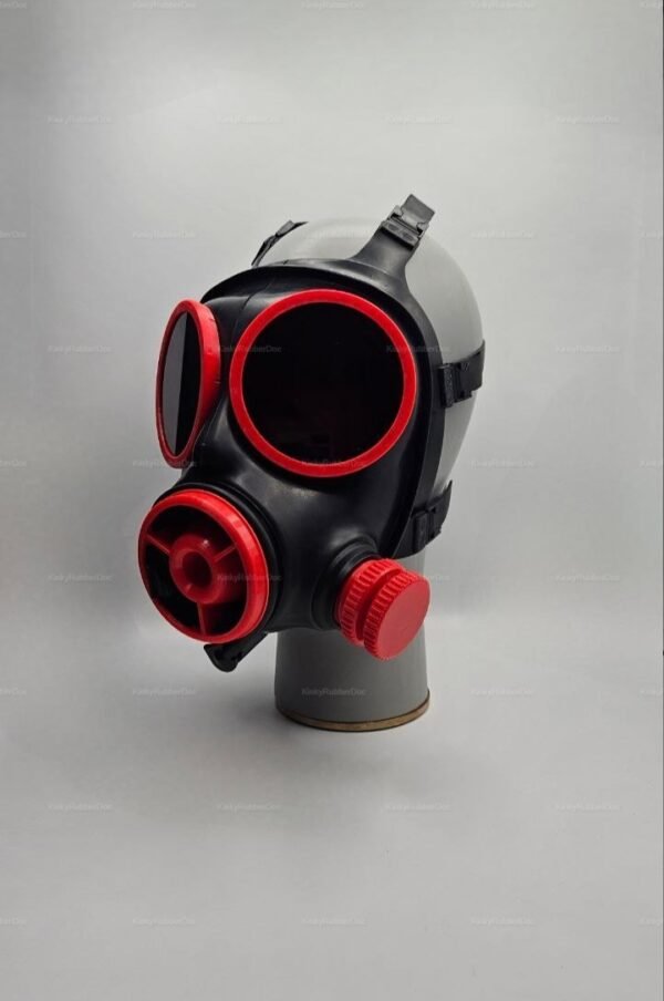 A bold, black gas mask with striking red accents, designed for a daring aesthetic.